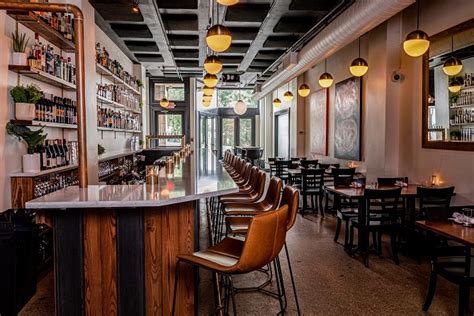 District bar and kitchen - District Bar and Kitchen is a 6,700-square-foot restaurant and bar that can accommodate over 200 guests and features a second floor terrace overlooking Brick …